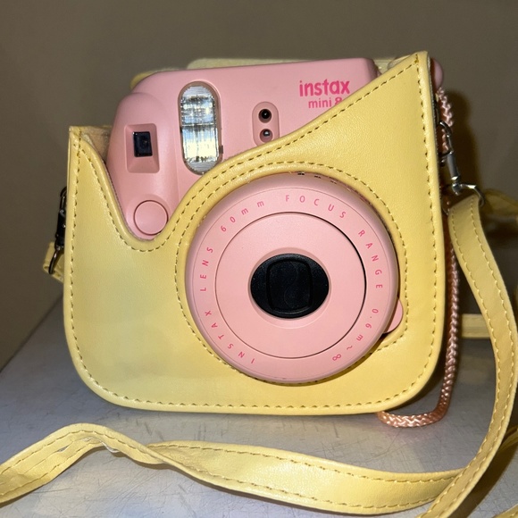 Instax mini 8- light pink Polaroid camera with yellow case